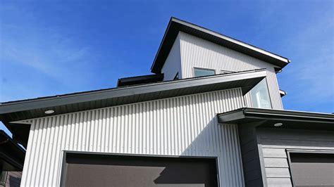 house metal siding meaning|houses with vertical metal siding.